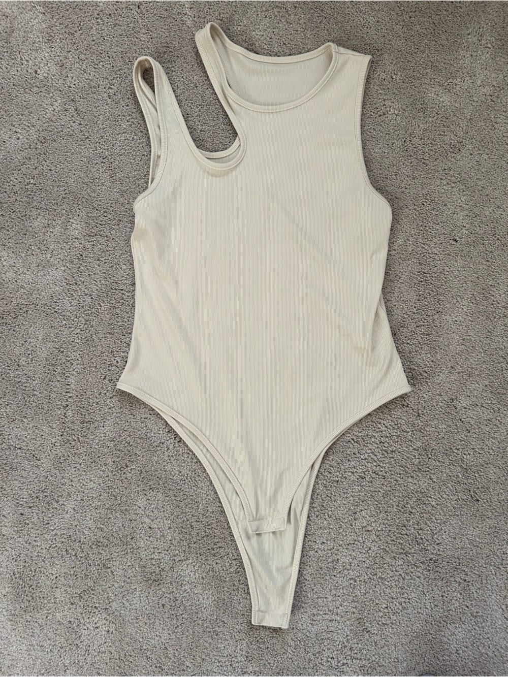 Asymmetric One-Piece Bodysuit in Cream